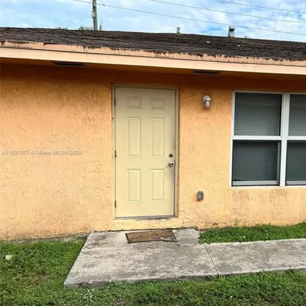 Rent this 4 bed house on 2110 Northwest 100th Street in Miami-Dade County, FL 33147