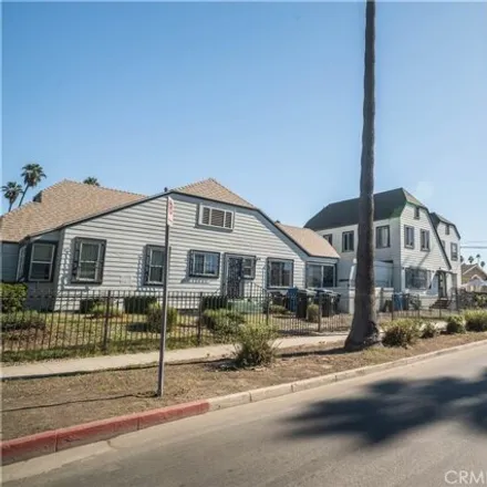 Buy this 11 bed house on 5424 Cimarron Street in Los Angeles, CA 90062