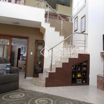 Buy this 3 bed house on Rua País de Gales in Marechal Rondon, Canoas - RS