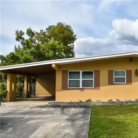 Rent this 4 bed house on 1883 Collier Avenue in Fort Myers, FL 33901