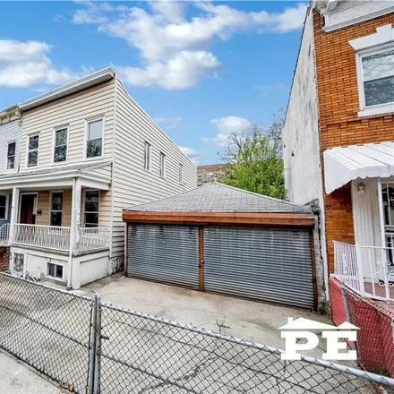 Buy this 6 bed townhouse on 875 East 15th Street in New York, NY 11230