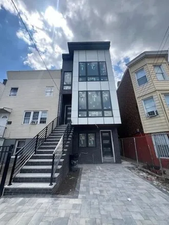 Buy this 7 bed house on 85 Stegman Street in Jersey City, NJ 07305