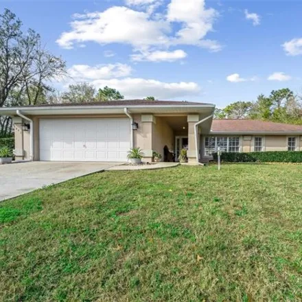 Buy this 3 bed house on 1873 East Allegrie Drive in Citrus County, FL 34453