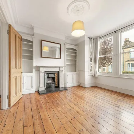Rent this 4 bed townhouse on Sarsfeld Road in London, SW12 8HN