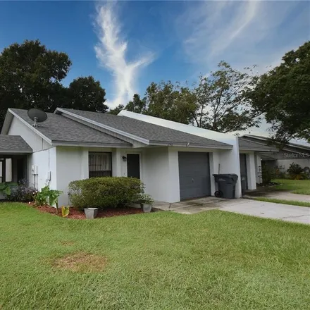 Rent this 2 bed house on 1136 Dosseywood Lane in Polk County, FL 33811