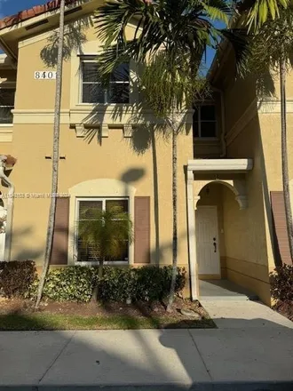Rent this 4 bed townhouse on 8401 Northwest 107th Court