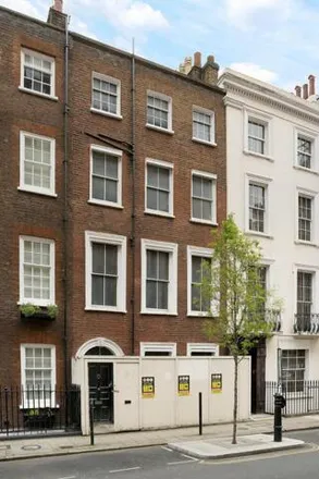 Buy this 4 bed townhouse on 70 Park Street in London, W1K 2JS