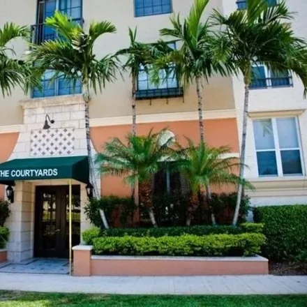 Rent this 2 bed condo on Okeechobee Parking Garage in The Square, South Rosemary Avenue