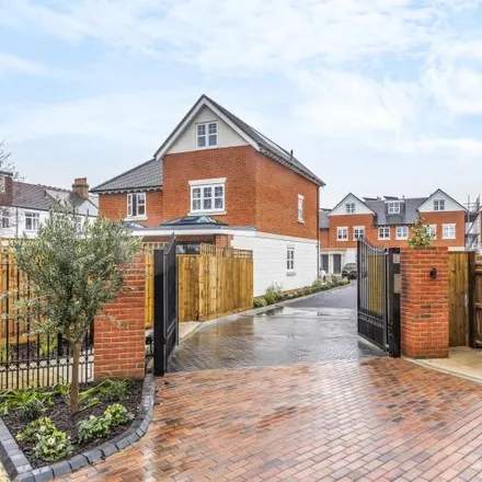 Rent this 4 bed house on 5 Bowling Green Mews in London, SW20 8DJ