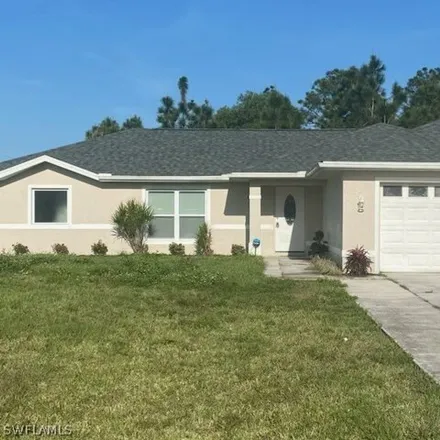 Buy this 4 bed house on 110 Sanborn Drive in Lehigh Acres, FL 33972