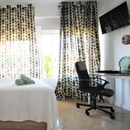 Rent this 4 bed room on Carrer de Campoamor in 46021 Valencia, Spain