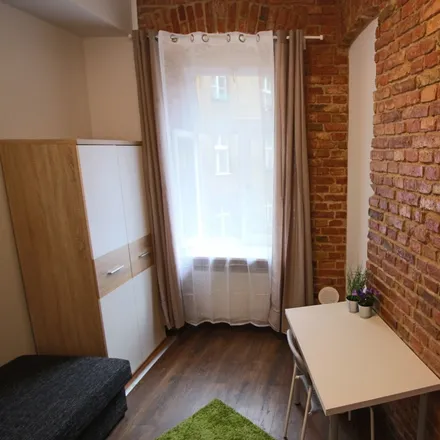 Rent this 5 bed room on Ogrodowa 16 in 61-820 Poznań, Poland