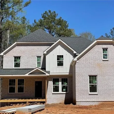 Buy this 4 bed house on 3258 Creekside Dr Se in Conyers, Georgia