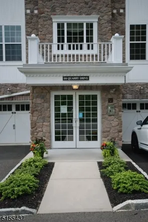 Buy this 2 bed townhouse on 82 Quarry Drive in Woodland Park, NJ 07424