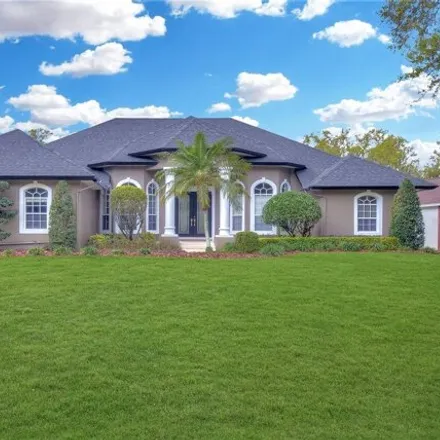 Buy this 4 bed house on 7398 Millbrook Oaks Drive in Polk County, FL 33813