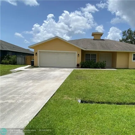 Buy this 4 bed house on 120 Southwest Grimaldo Terrace in Port Saint Lucie, FL 34984