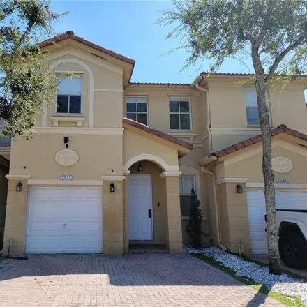 Rent this 4 bed townhouse on 7831 Northwest 107th Court in Doral, FL 33178