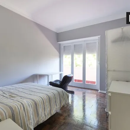 Rent this 11 bed room on Rua do Arco de Cego 75 in 1000-149 Lisbon, Portugal