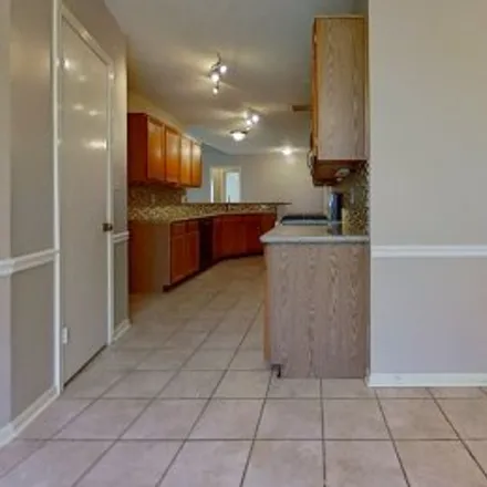 Rent this 3 bed apartment on 5539 Rivertree Lane in Bridgestone West, Spring