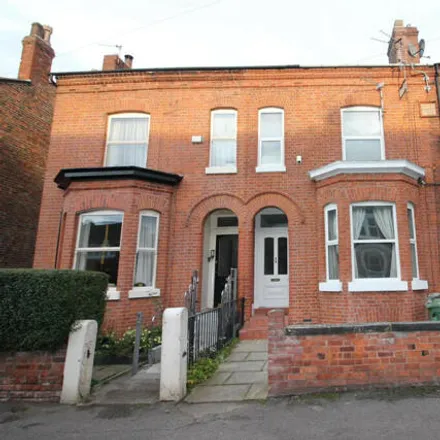 Rent this 4 bed townhouse on 65 Roseneath Road in Urmston, M41 5AX