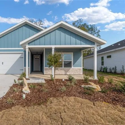 Buy this 4 bed house on 1015 Sw 66th Ln in Gainesville, Florida