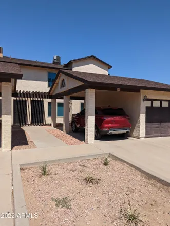 Rent this 3 bed townhouse on 306 East Ludlow Drive in Avondale, AZ 85323