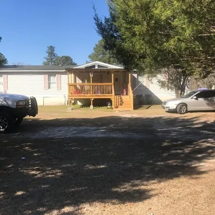 Buy this studio apartment on 4183 Pond Loop Road in Sumter County, SC 29154