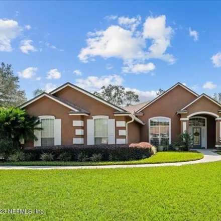 Buy this 4 bed house on 1422 Wilshire Court South in Fruit Cove, FL 32259