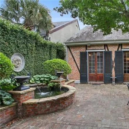 Buy this 4 bed house on 539 Burgundy Street in New Orleans, LA 70112