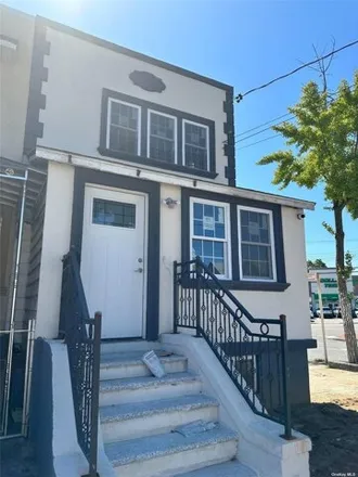 Buy this 4 bed house on 109-01 106th Street in New York, NY 11417