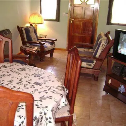 Buy this 3 bed house on Avenida 6 in Partido de Villa Gesell, 7165 Villa Gesell