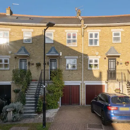 Rent this 5 bed townhouse on Stott Close in London, SW18 2TG