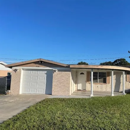 Buy this 3 bed house on 3749 Cedarwood Drive in Holiday, FL 34691