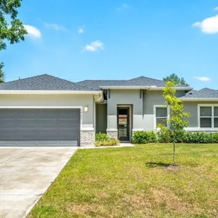 Buy this 4 bed house on 1957 Missouri Road Northwest in Palm Bay, FL 32907