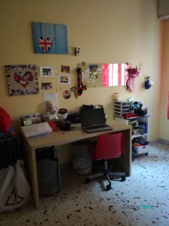 Rent this studio room on Via Curzio Rufo in 7, 00175 Rome RM