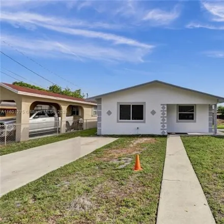 Buy this 3 bed house on 4021 SW 25th St in West Park, Florida