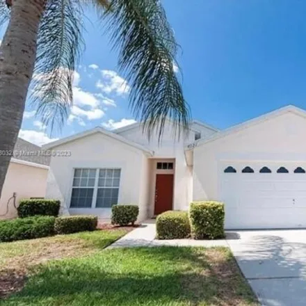 Buy this 4 bed house on 8120 Fan Palm Way in Kissimmee, FL 34747