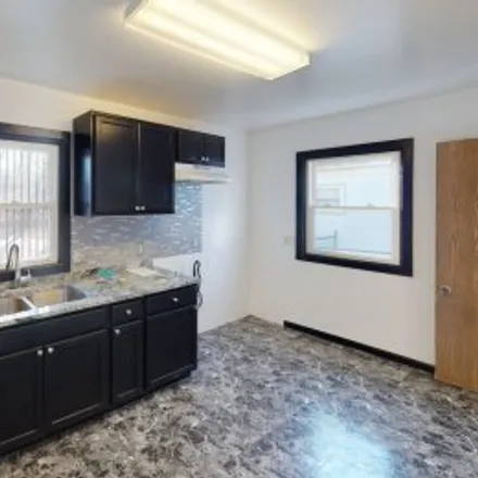 Rent this 3 bed apartment on 1124 Underwood Avenue in Scott Park, Toledo