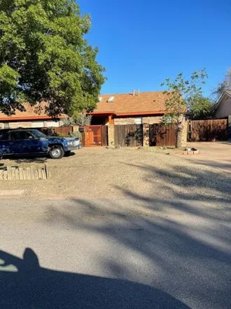 Rent this 4 bed house on 716 W Dormard Ave in Midland, Texas