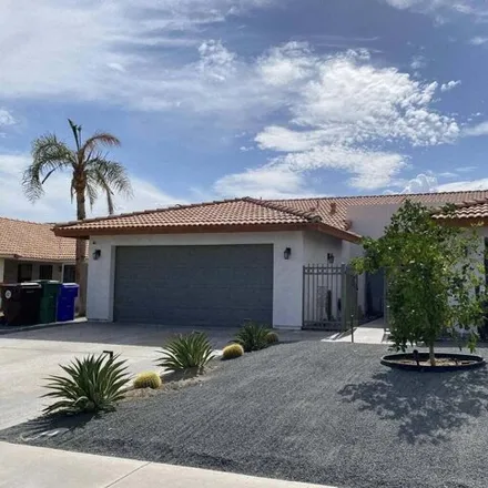 Rent this 3 bed house on 30925 Avenida Juarez in Cathedral City, CA 92234