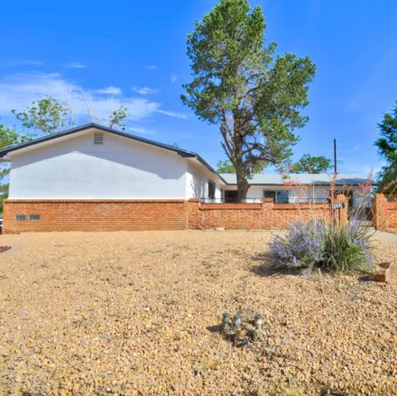 Buy this 5 bed house on 1800 Parsifal Street Northeast in Albuquerque, NM 87112