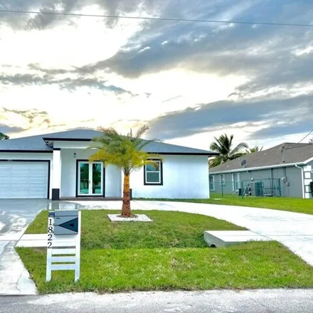 Buy this 4 bed house on 1818 Southwest Monterrey Lane in Port Saint Lucie, FL 34953