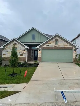 Rent this 4 bed house on Perritos Place in Travis County, TX 78652