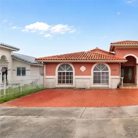 Buy this 4 bed house on 3198 West 68th Place in Hialeah, FL 33018