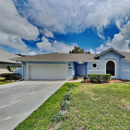 Rent this 4 bed house on 5514 Southwest 89th Avenue in Cooper City, FL 33328