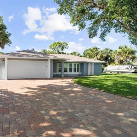 Buy this 4 bed house on 157 Driskell Street Northeast in Palm Bay, FL 32907