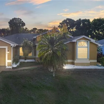 Buy this 4 bed house on 86 Holiday Park Boulevard Northeast in Palm Bay, FL 32907