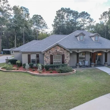 Buy this 5 bed house on 5850 Northeast 43rd Lane Road in Marion County, FL 34488