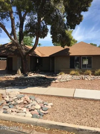 Rent this 3 bed house on 1654 West Keating Avenue in Mesa, AZ 85202