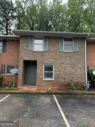Buy this 3 bed townhouse on 4401 Golf Vista Circle in DeKalb County, GA 30035